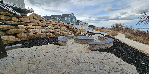 Modern gas fire pit with concrete surround