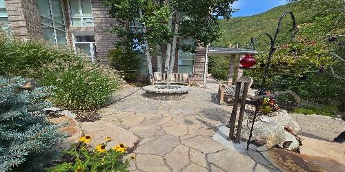 Elegant rectangular fire pit with glass rocks