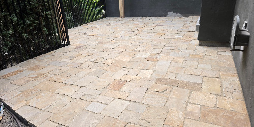 Patio with a built-in grill and counter