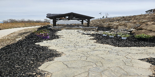 Stone patio with built-in grill