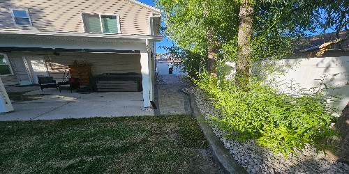 Circular patio with a central fire pit